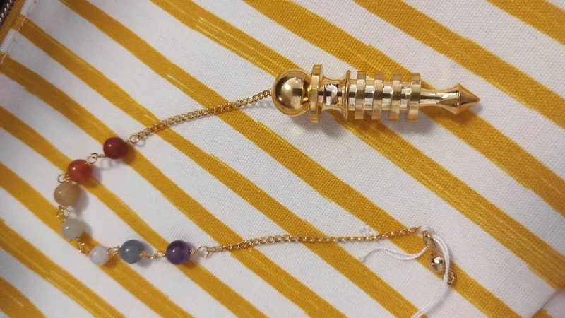 Pendule Isis doré