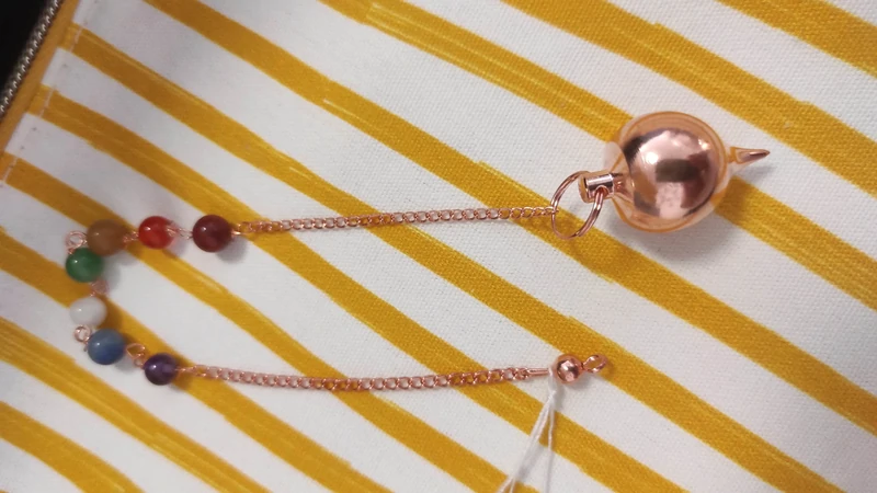 Pendule boule en cuivre
